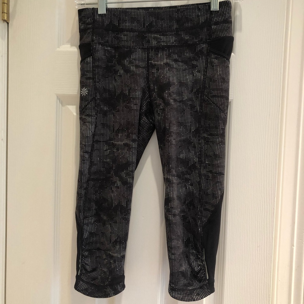 Athleta xs leggings with geometric design.